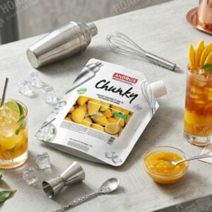 Mango puree in snowy background.